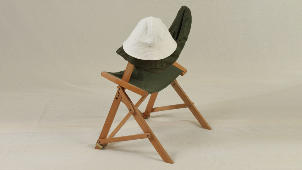 French sailor bucket hat on a vintage chair